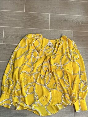 CAbi Yellow Rope & Anchor Tie-Neck Blouse Women’sll Sz Large 
100% polyester
